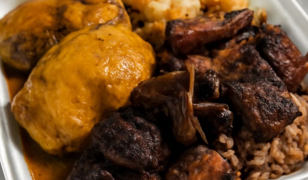 A vibrant mix of Jamaican yard vibes and Thai cuisine