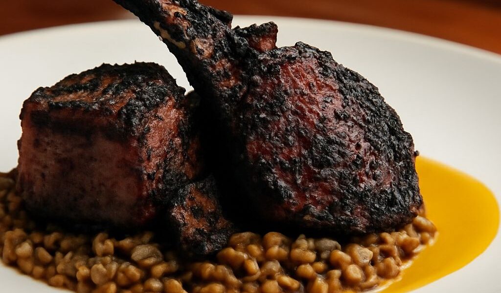 Chops served with a rusted spoon and a side of lichee nut crostatas